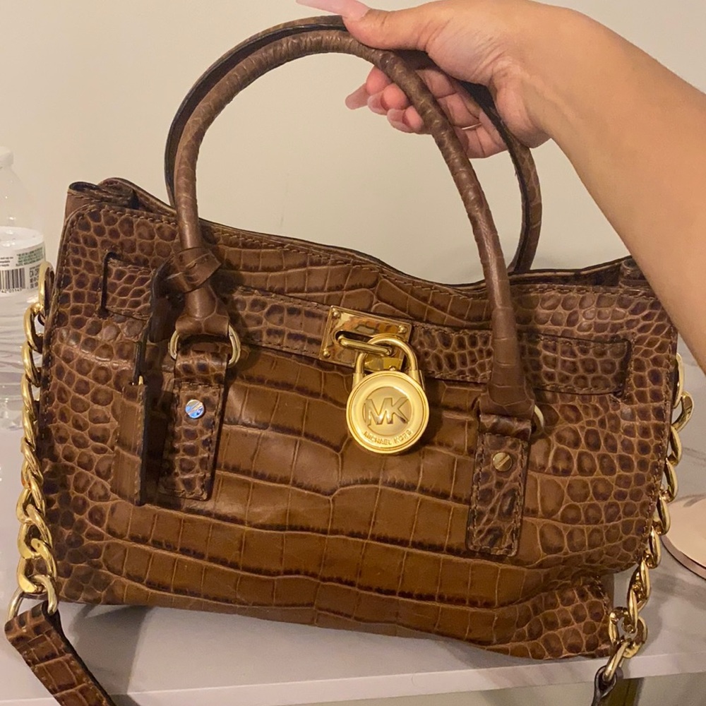 MK crocodile purse